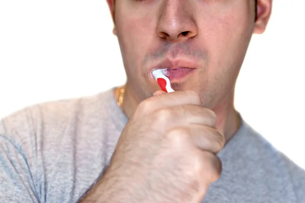 彼の歯を磨く — ストック写真