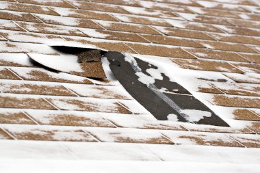 Winter Damaged Roof Shingles clipart