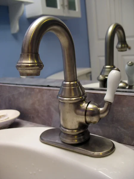 Brushed nickel faucet — Stock Photo, Image