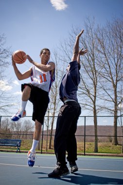 Men Playing Basketball clipart