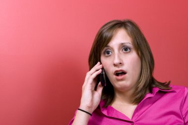 Surprised Woman on the Phone clipart