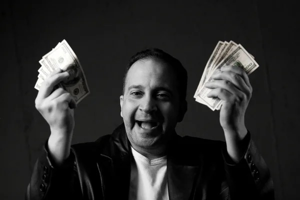 Homem comemorando com dinheiro — Fotografia de Stock