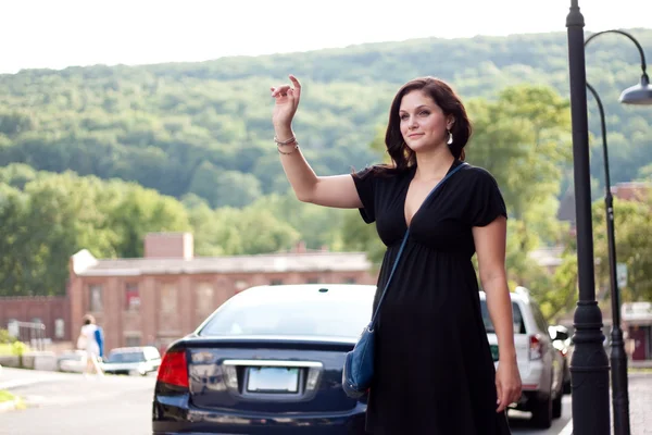Woman Hailing a Taxi Cab — Stock Photo, Image
