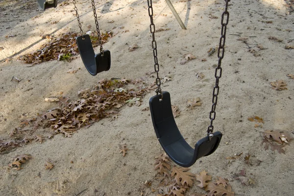 Playground swings — Stock Photo, Image