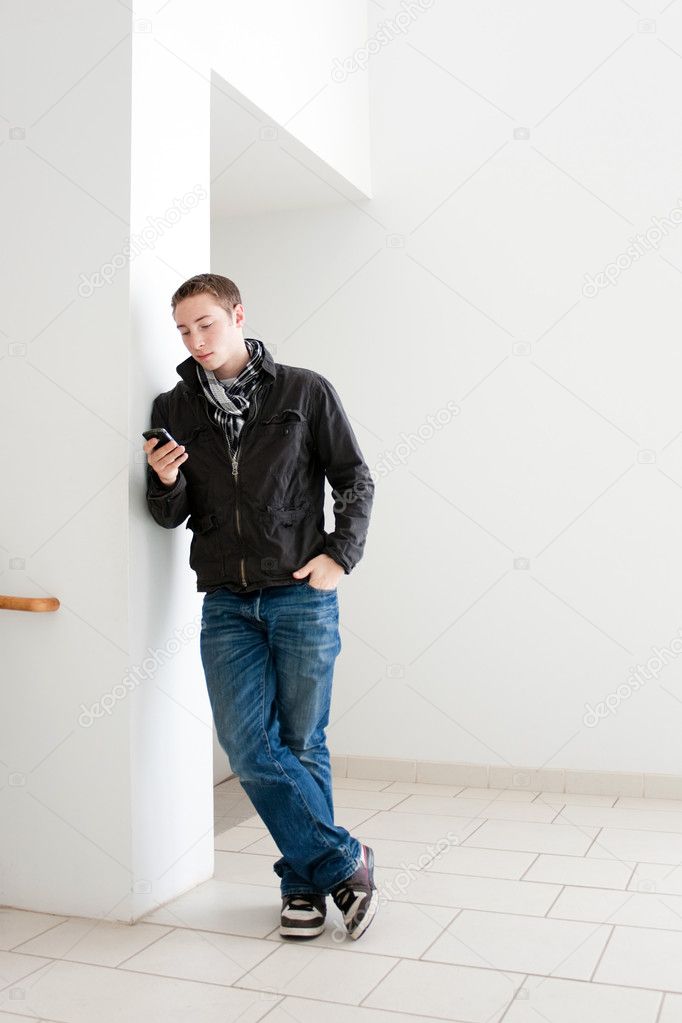 Man Looking At His Cell Phone
