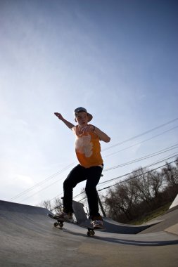 Skateboarder at the Skate Park clipart
