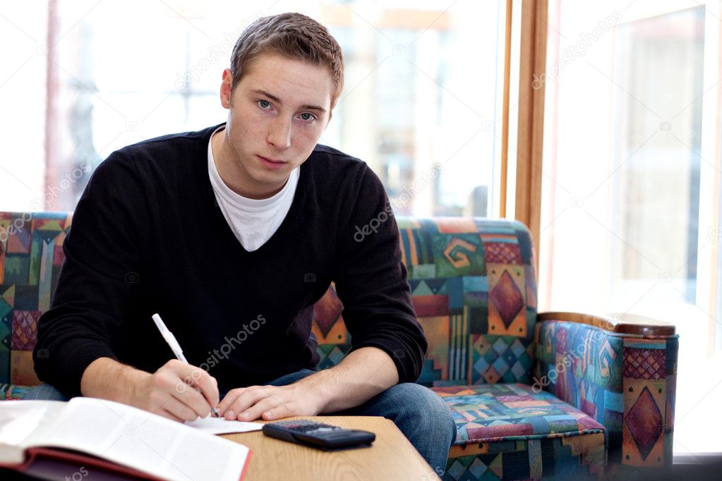 Male College Student Doing His Homework