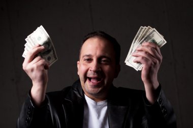 Man Holding Out Money clipart