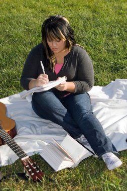 Musician Writing a Song clipart