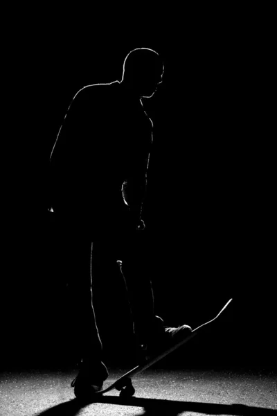 Rim Lit Skateboarder Silhouette — Stock Photo, Image