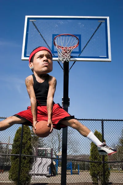 Jogador de basquete de cabeça grande — Fotografia de Stock