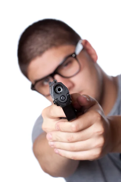 Adolescente cara apontando uma arma — Fotografia de Stock