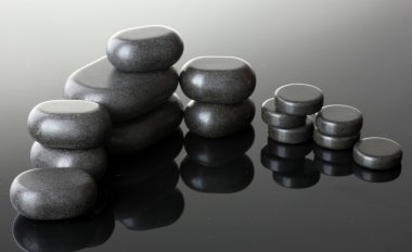 Spa stones on grey background clipart