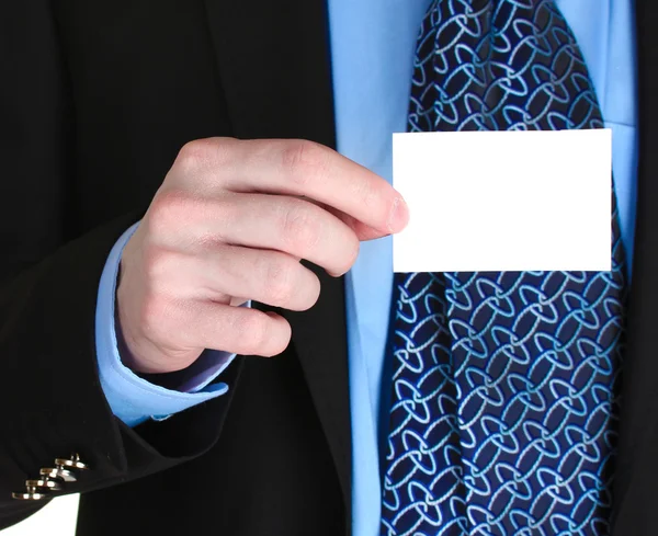 Podnikatel drží kreditní kartu izolované na bílém — Stock fotografie