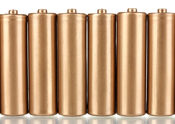 Goldene Batterien isoliert auf weiß — Stockfoto