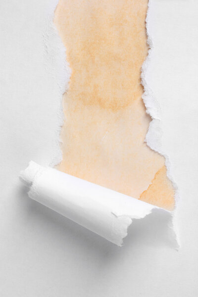 Torn paper with brown background