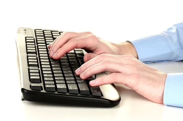 Erkek eller üzerinde beyaz izole klavye yazarak — Stok fotoğraf