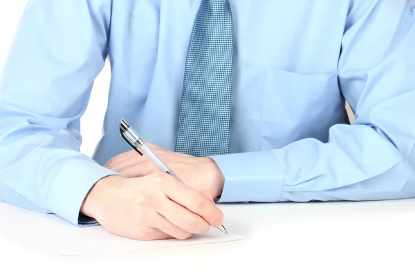 Businessman writing on document — Stock Photo, Image