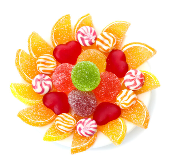 Colorful jelly candies on plate isolated on white