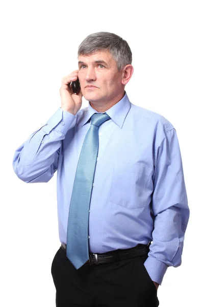 Homme d'affaires au téléphone contre isolé sur blanc — Photo