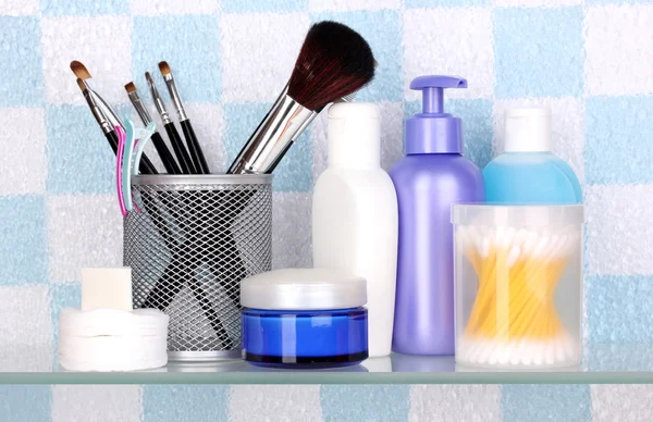 stock image Shelf with cosmetics and toiletries in bathroom