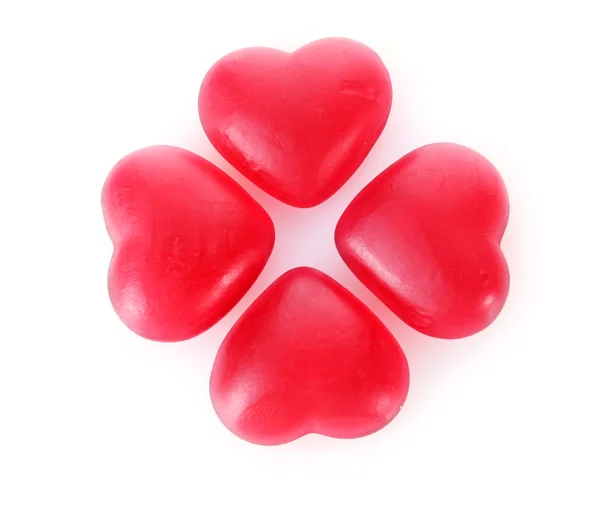 Beyaz izole kırmızı şeker Kalpler — Stok fotoğraf