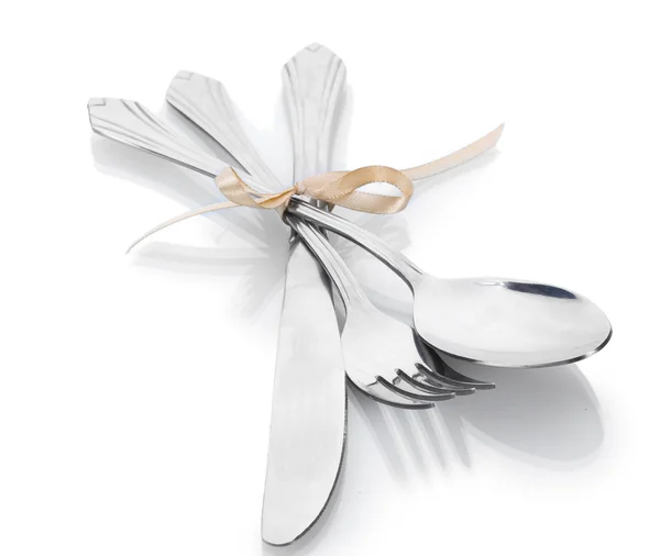 Silver fork and spoon, knife tied with ribbon isolated on white — Stock Photo, Image