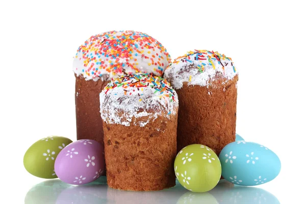Beautiful Easter cakes and colorful eggs isolated on white — Stock Photo, Image