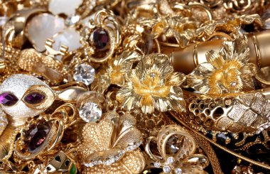 Beautiful golden jewelry close up clipart