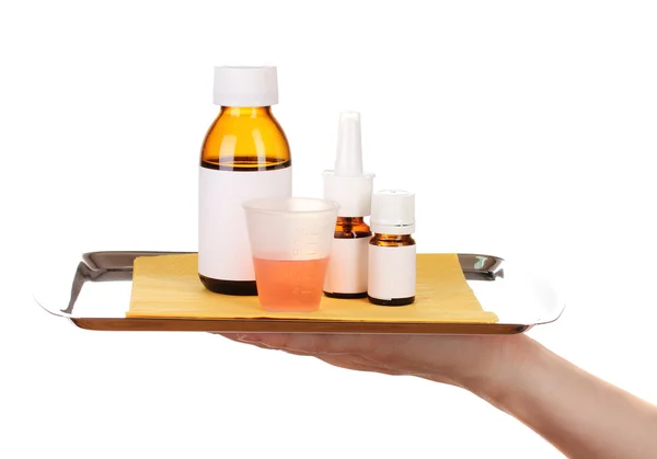 Hand holding tray with medicines isolated on white — Stock Photo, Image