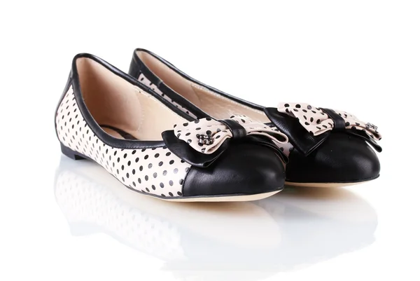 Female flat ballet shoes patterned with black polka dots isolated on white — Stock Photo, Image