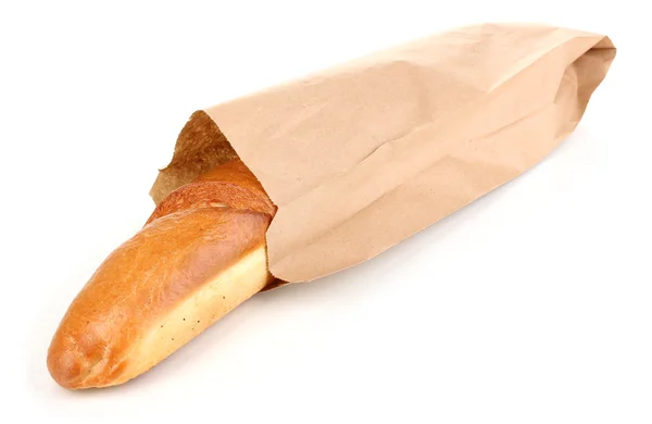 Aromatic baguette in paper bag isolated on white — Stock Photo, Image