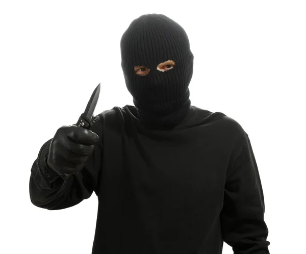 Bandido em máscara preta com faca isolada em branco — Fotografia de Stock