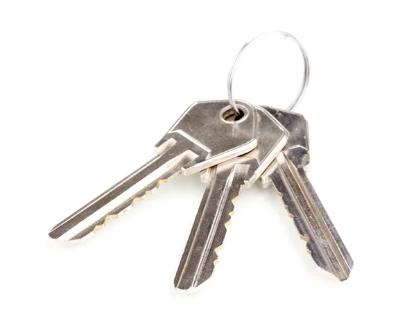Három keys a elszigetelt fehér fém gyűrű — Stock Fotó