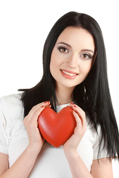 Vacker ung flicka håller rött hjärta isolerad på vit — Stockfoto