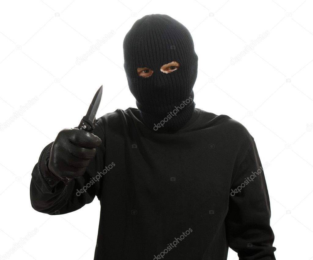 Bandit in black mask with knife isolated on white