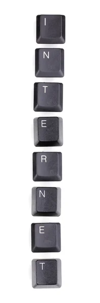Клавіатурні клавіші, що говорять про Інтернет ізольовані на білому — стокове фото