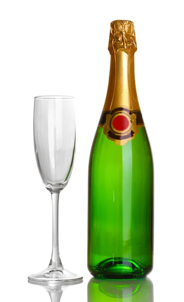 Láhev šampaňského a pohár izolovaných na bílém — Stock fotografie