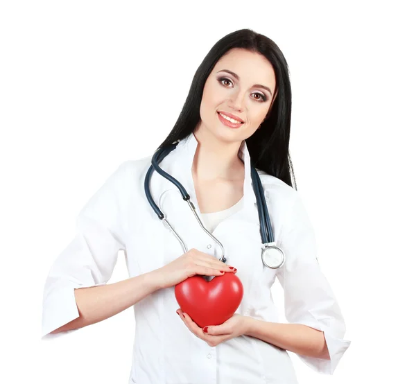 Ung vacker läkare med stetoskop hålla hjärtat isolerad på vit — Stockfoto