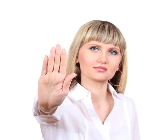 Молода жінка робить стоп жест ізольованим на білому — стокове фото