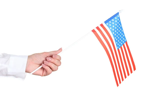 Vrouwelijke hand met Amerikaanse vlag geïsoleerd op wit — Stockfoto