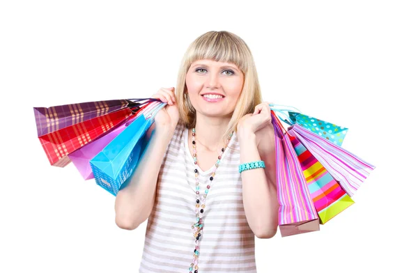 Bela jovem mulher com sacos de compras isolado no branco — Fotografia de Stock