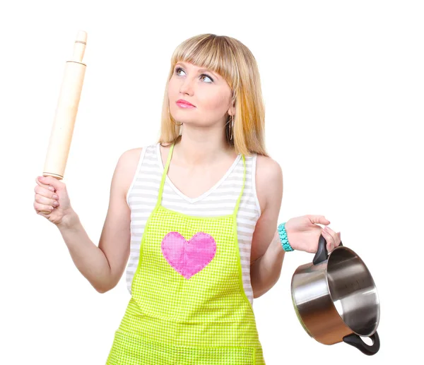 Beautiful young housewife with pan and plunger isolated on white — Stock Photo, Image