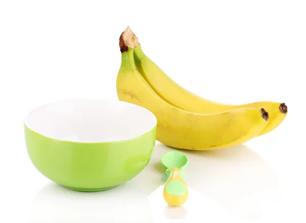 Baby plate and spoon with bananas isolated on white — Stock Photo, Image