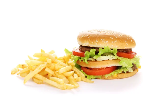 Big and tasty hamburger and fried potatoes isolated on white — Stock Photo, Image