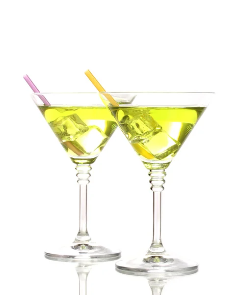 Yellow cocktail in martini glasses isolated on white — Stock Photo, Image
