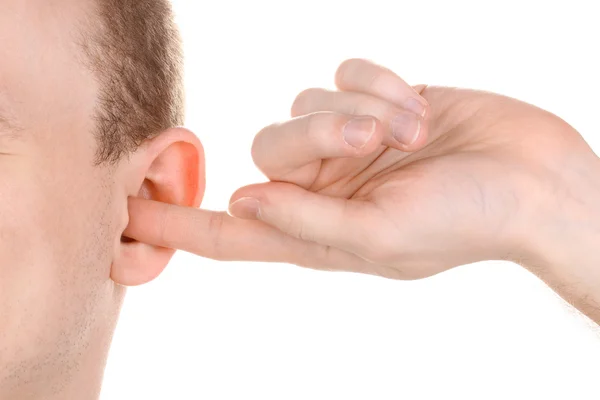 Mänskliga örat och hand närbild isolerad på vit — Stockfoto