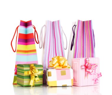 Colorful gift bags with gifts isolated on white clipart