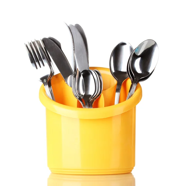 厨房餐具、 刀、 叉和匙在黄色立场上白色隔离 — 图库照片