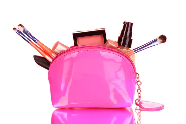 Make-up-Tasche mit Kosmetik und Pinseln auf rosa Hintergrund — Stockfoto